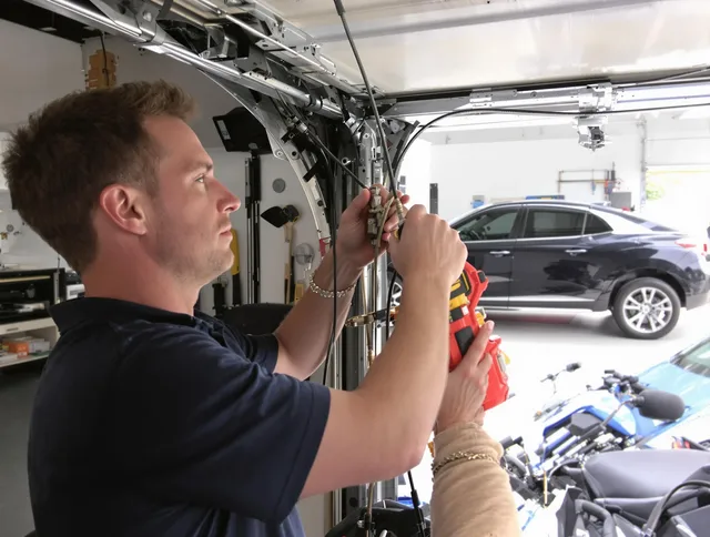 Wethersfield Garage Door Repair safety certified technician performing cable replacement in Wethersfield