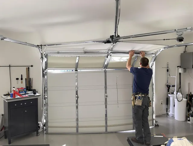 Wethersfield Garage Door Repair specialist performing precise section replacement on Wethersfield garage door